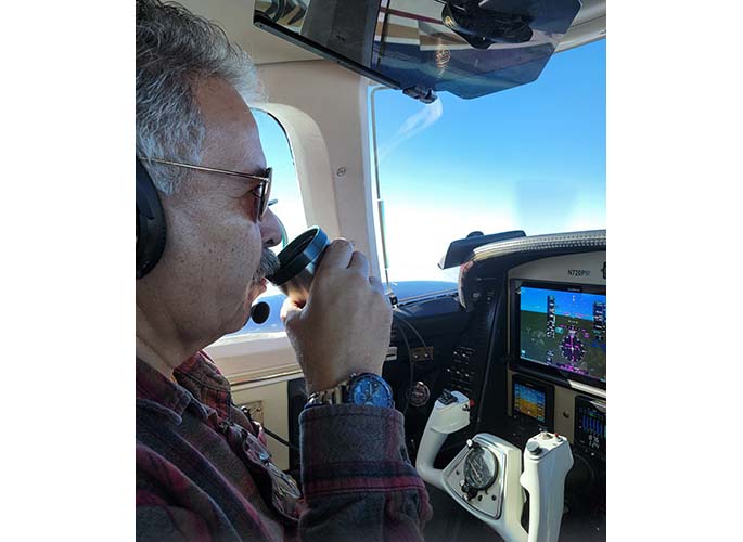 Pilot Pete Messina in the cockpit